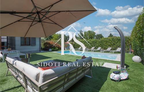 ESCLUSIVA RESIDENZA CON GIARDINO E PISCINA